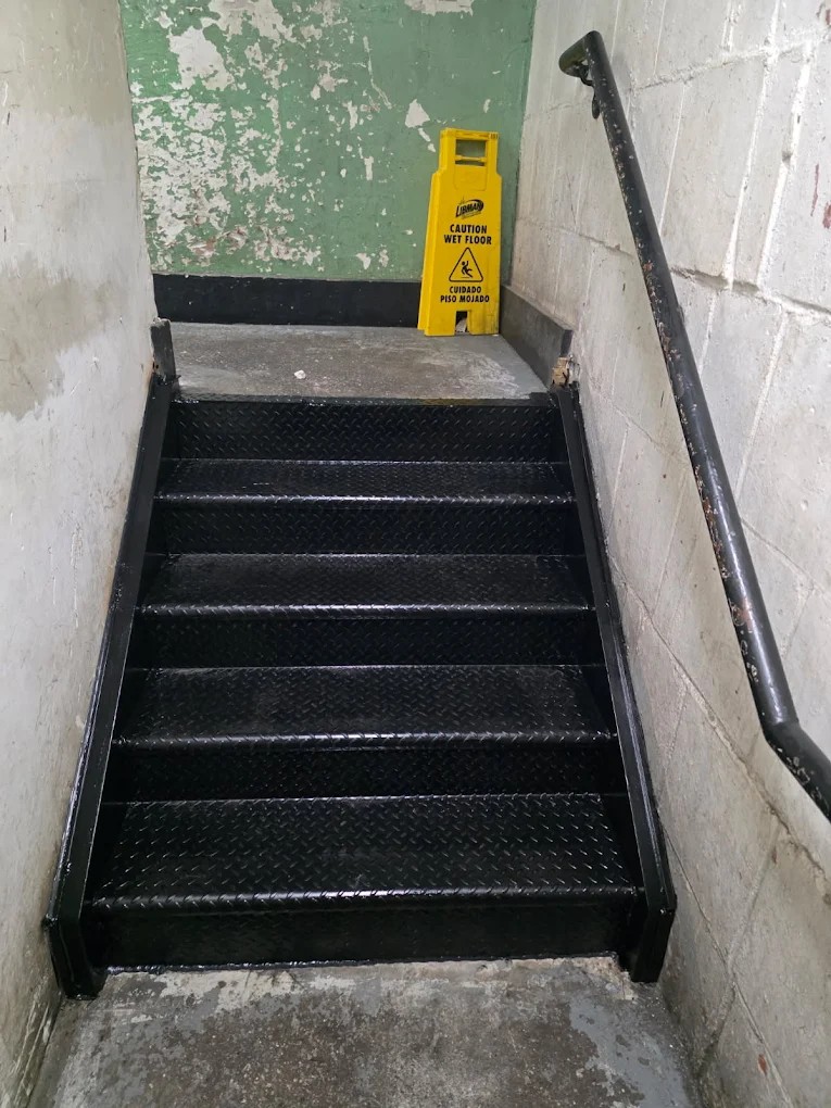 Steel staircase and guardrail installation in a Brooklyn commercial building