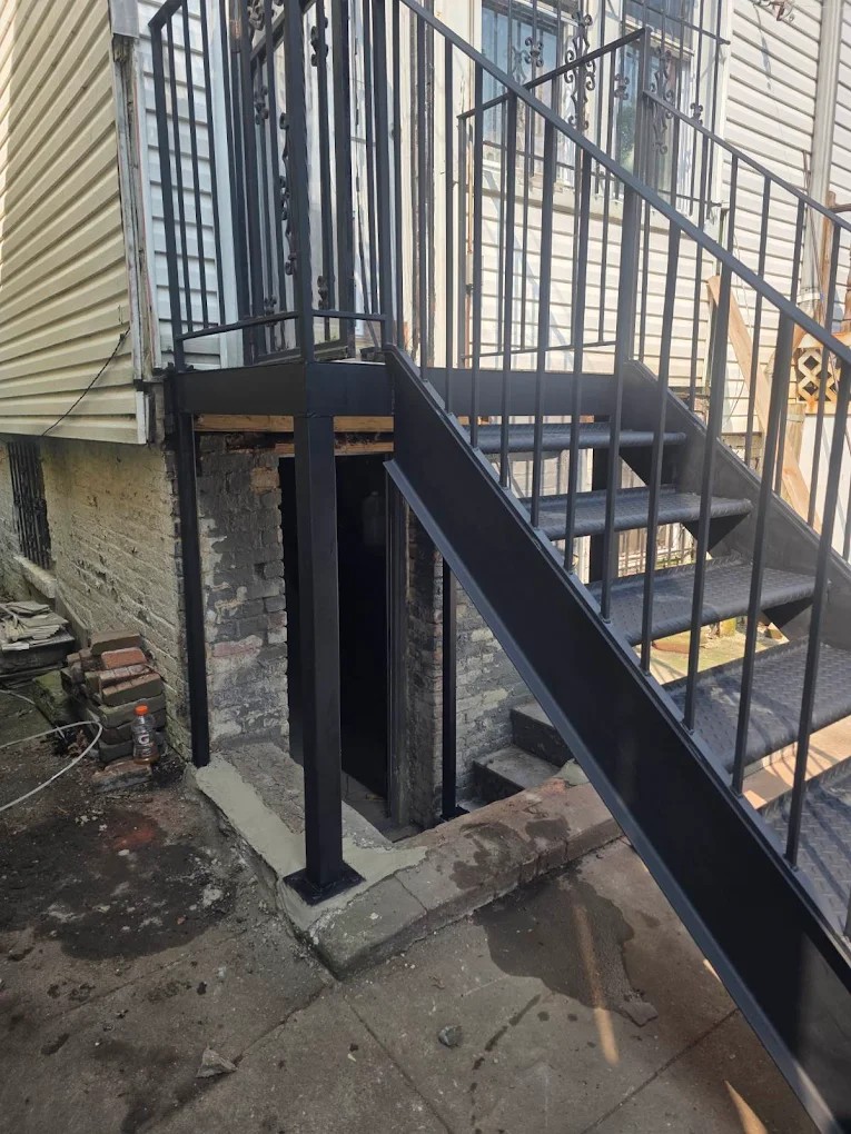 Custom Economaster trash bin enclosure fabricated and installed by Steel Masters NYC in Brooklyn